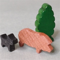 lyserød gris grønt træ og sort skotte hund gammelt træ legetøg